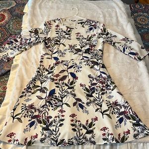 Banana Republic dress.White background with green,navy and burgundy floral. Sz10